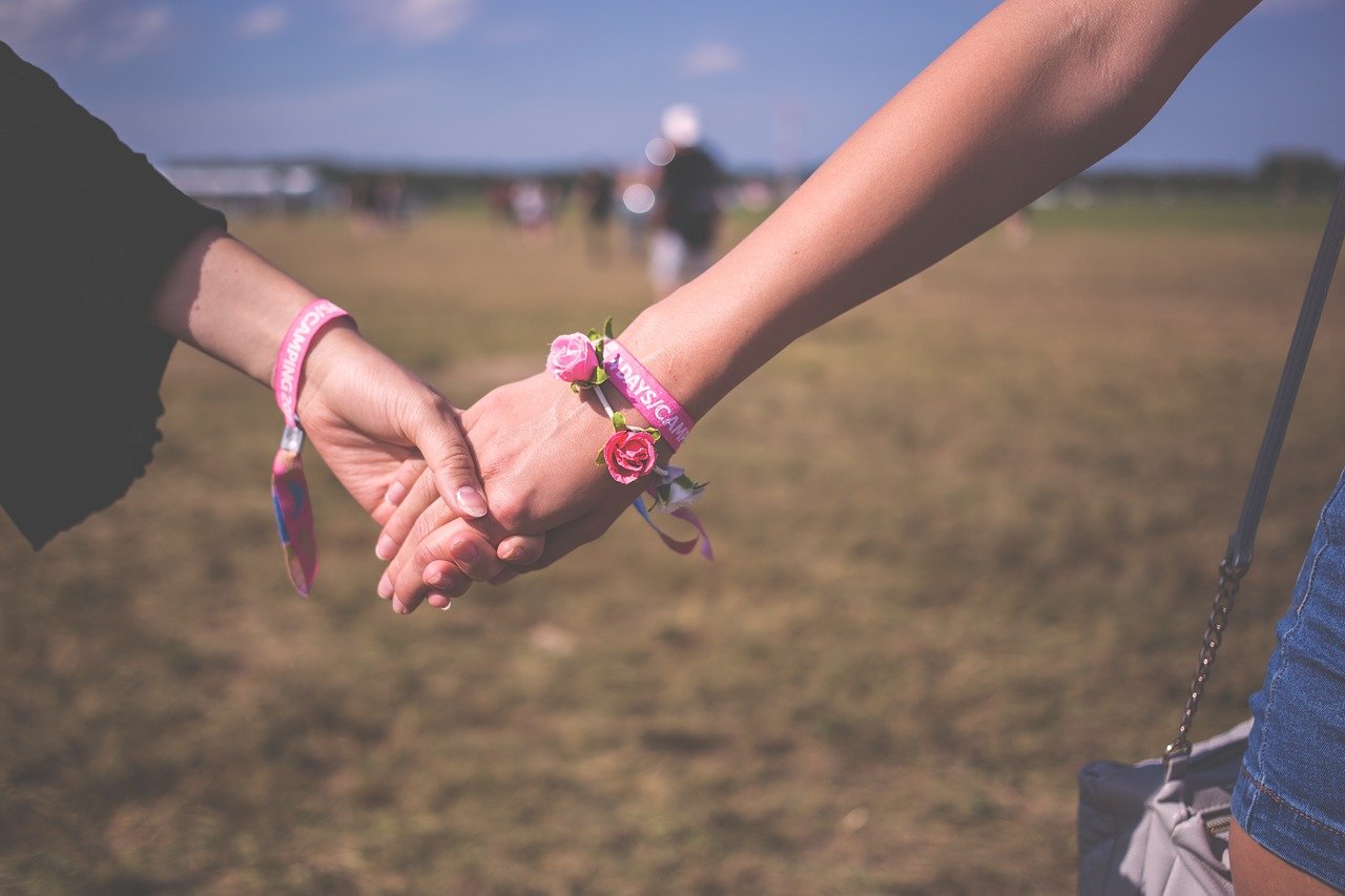 lesbian couple holding hands
